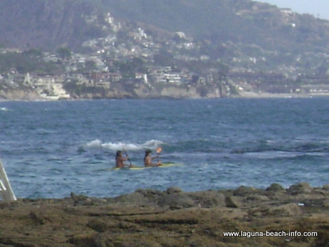 Kayakers at Fishermans Cove, Laguna Beach, California