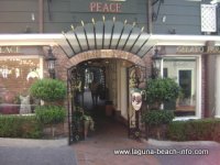Peppertree Lane including Sutton Place, Gelato Paradiso, La Rue Du Chocolat, as well as Watermarc Restaurant and the Saloon Bar, Laguna Beach Shops, Laguna Beach, California