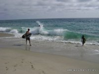 Skimboarders at Thousand Steps Beach, Laguna Beach, California