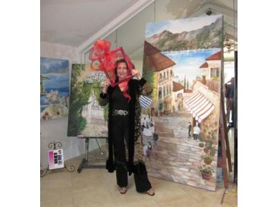 Artist Alexi Allens with her painting 