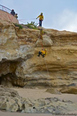 Firefighters practicing cliffside rescues