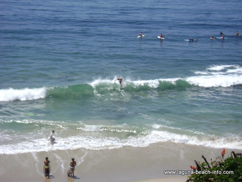 Surfer and Skimboarder at Thalia Street Beach, Laguna Beach, California